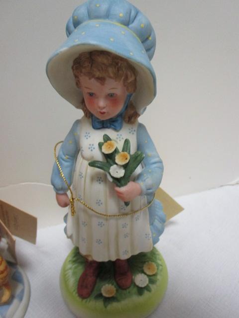Four Holly Hobby Figurines and Old Man and Woman Figurine.