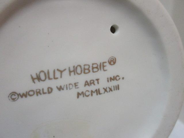 Four Holly Hobby Figurines and Old Man and Woman Figurine.