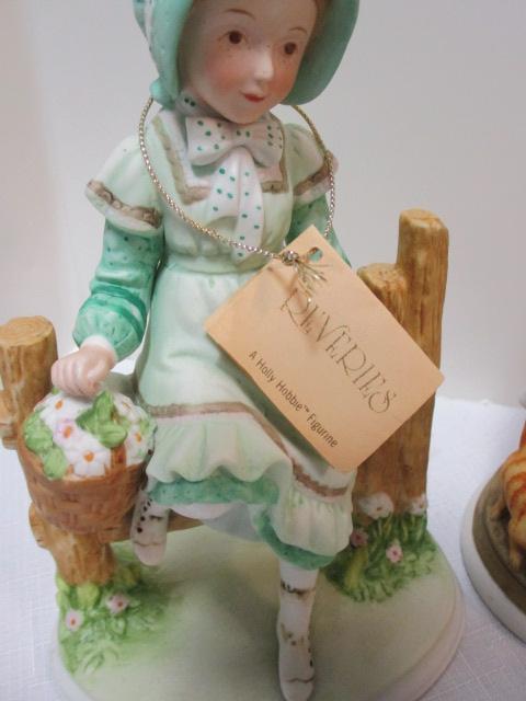 Four Holly Hobby Figurines and Old Man and Woman Figurine.