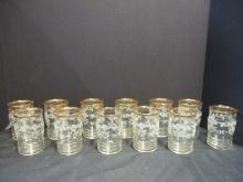 Mid Century Modern Twelve Juice Glasses with Gold Rim and White Floral Design.