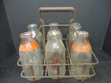 Six Vintage Quart Milk Bottles In Metal Carrying Case.