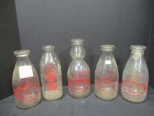 Five Vintage Pet Milk Bottles