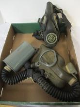 Two Military Gas Mask, One with Filter Canister.