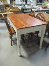 Solid Wood Farmhouse Table with Plank Top and Three side Chairs.