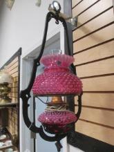 Fenton Cranberry Hobnail Lamp in Cast Iron Hanger