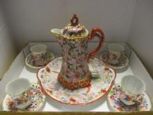 Oriental Tea Set with Tea Pot, Four Cups and Saucers and Signed Japan Serving Plate.