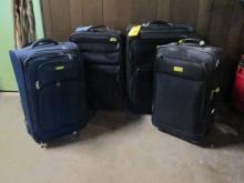 Four Soft Side Rolling Suitcases