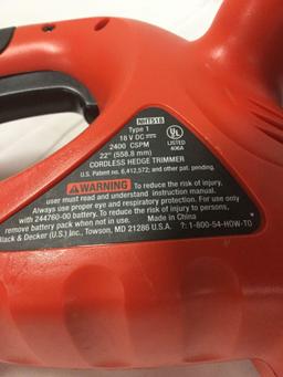 Black and Decker Hedgehog cordless 558mm hedge trimmer with Power Glide battery and charger