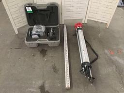 Lot of surveying equipment. Tripod, ruler, and Porter Cable RoboToolz RT-7690-2XP