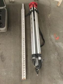 Lot of surveying equipment. Tripod, ruler, and Porter Cable RoboToolz RT-7690-2XP