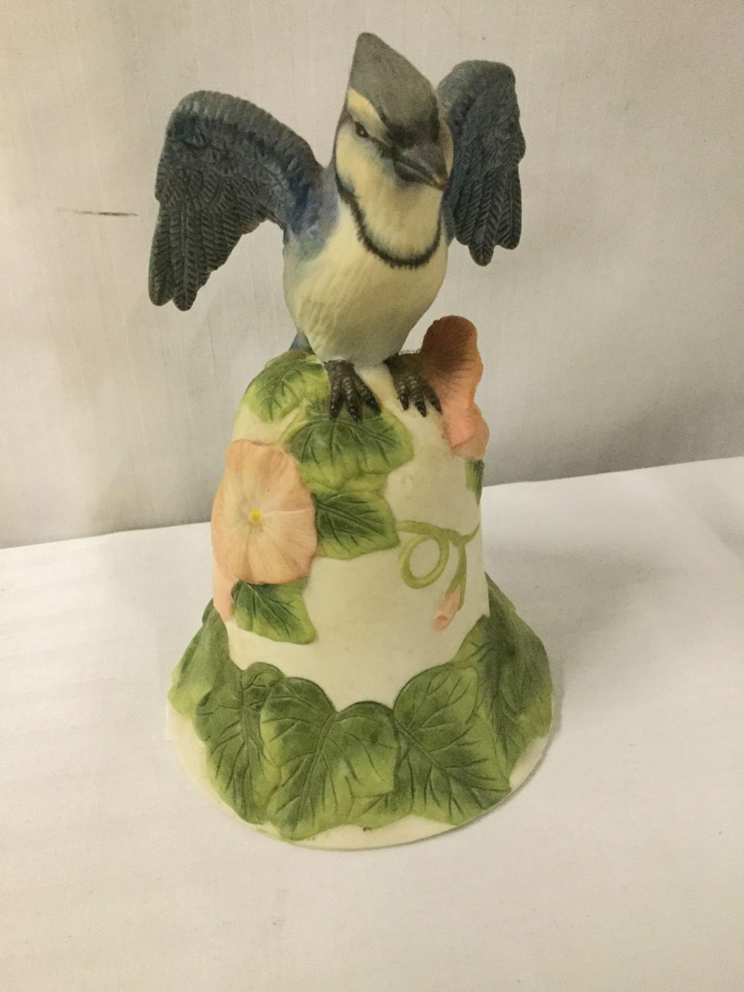 12 pc lot of bird figures incl. duck lamp, goose serving tray and other bird design collectibles