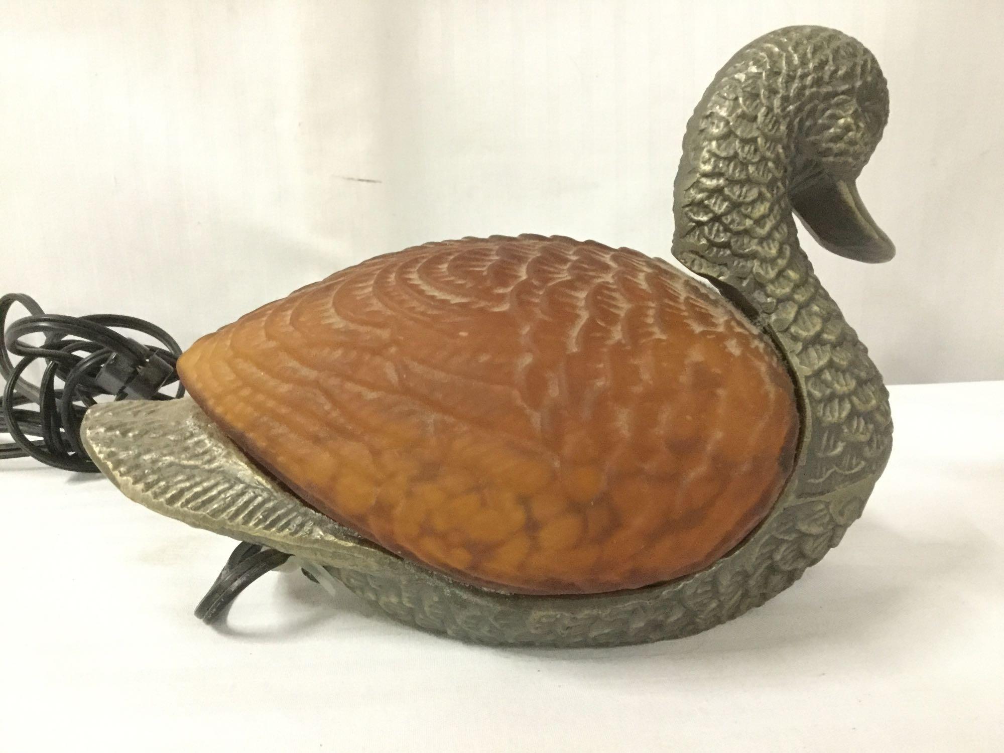 12 pc lot of bird figures incl. duck lamp, goose serving tray and other bird design collectibles