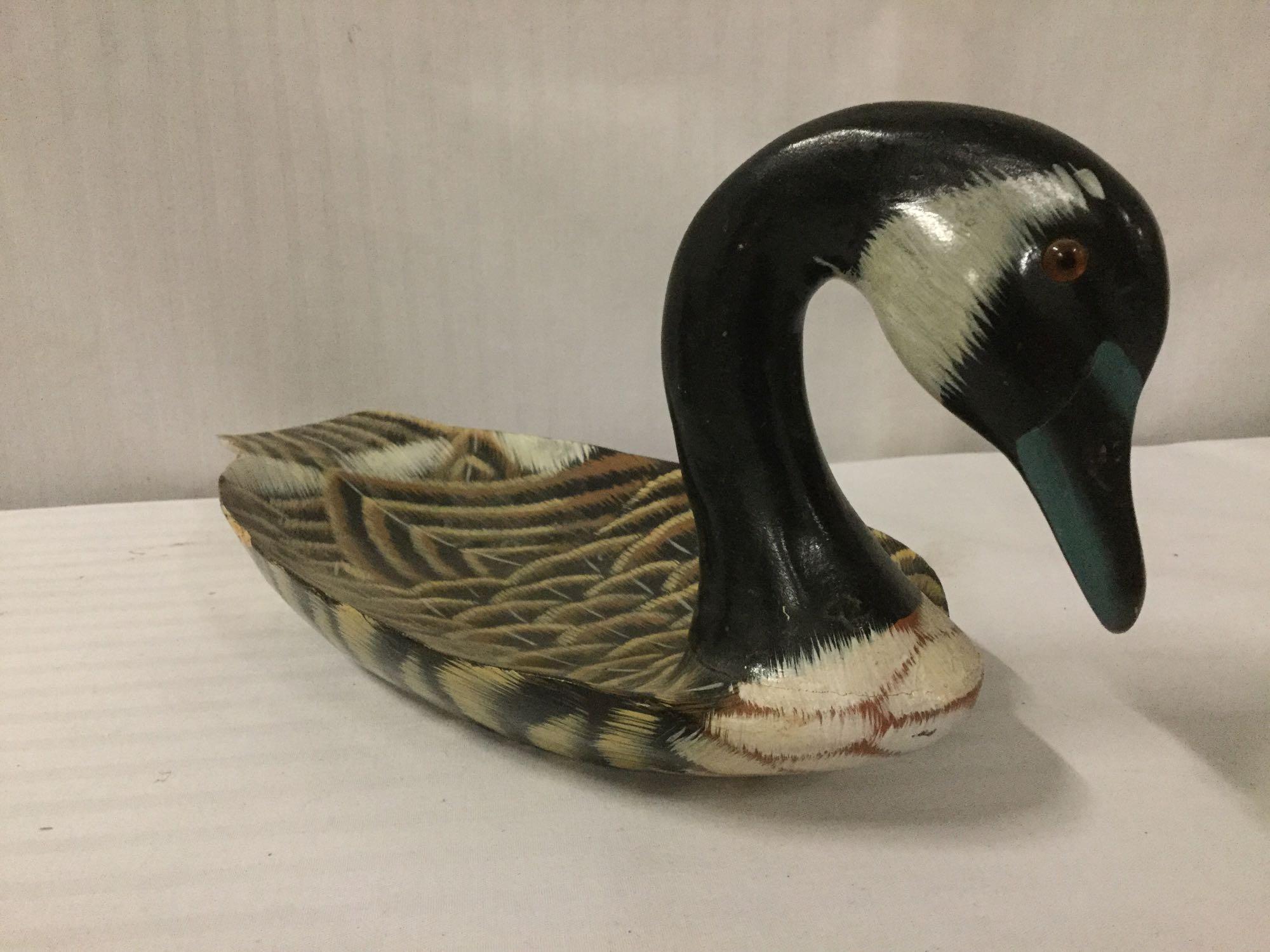 12 pc lot of bird figures incl. duck lamp, goose serving tray and other bird design collectibles