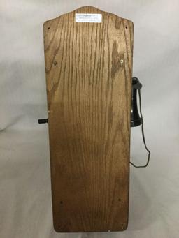 Vintage T.D.Y. Telephone Company hand crank type wood wall phone with dial, phone line, and extra