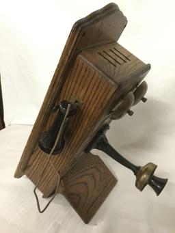 Vintage T.D.Y. Telephone Company hand crank type wood wall phone with dial, phone line, and extra