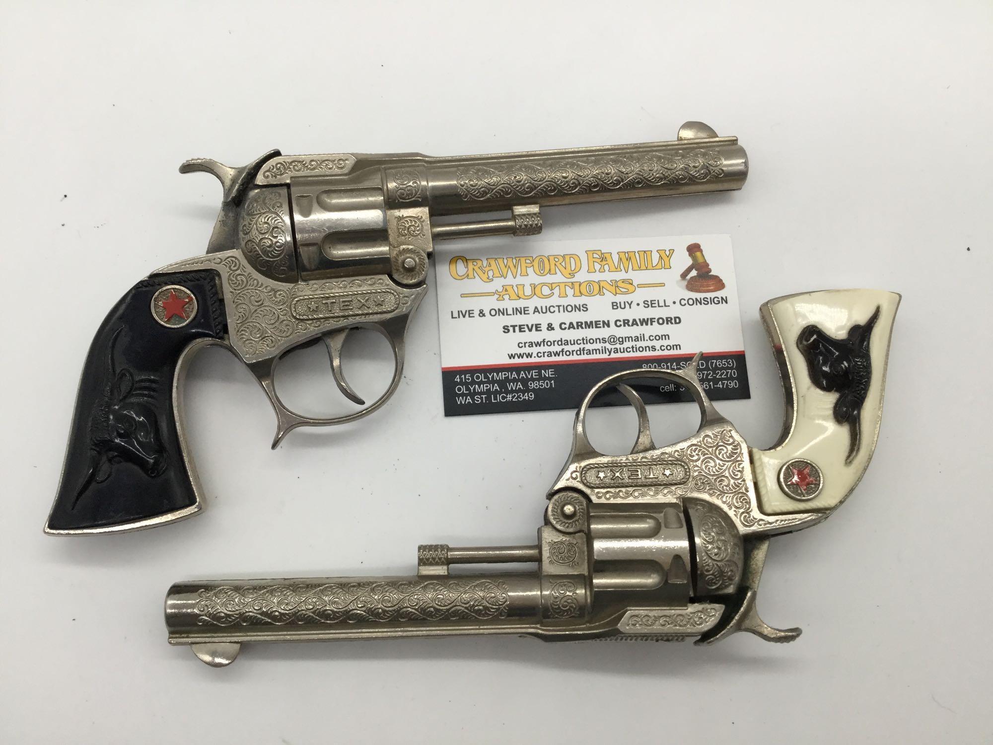 Pair of vintage Hubley Tex model revolver cap gun pistol w/ ornate designs and steer head handles
