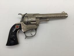Pair of vintage Hubley Tex model revolver cap gun pistol w/ ornate designs and steer head handles
