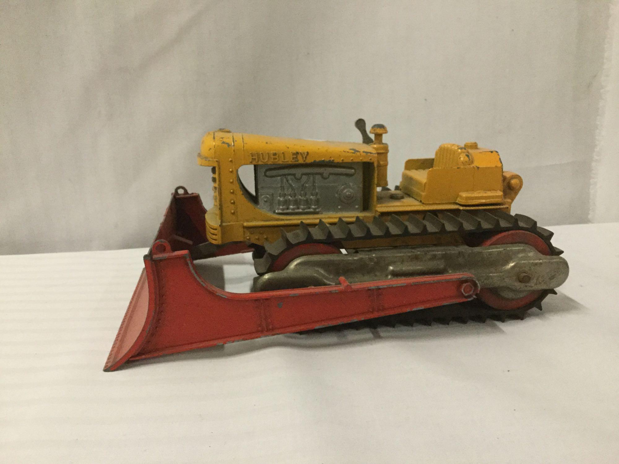 2 Hubley toy bulldozers incl. 1 yellow Hubley Diesel Toy bulldozer & 1 red Hubley toy bulldozer