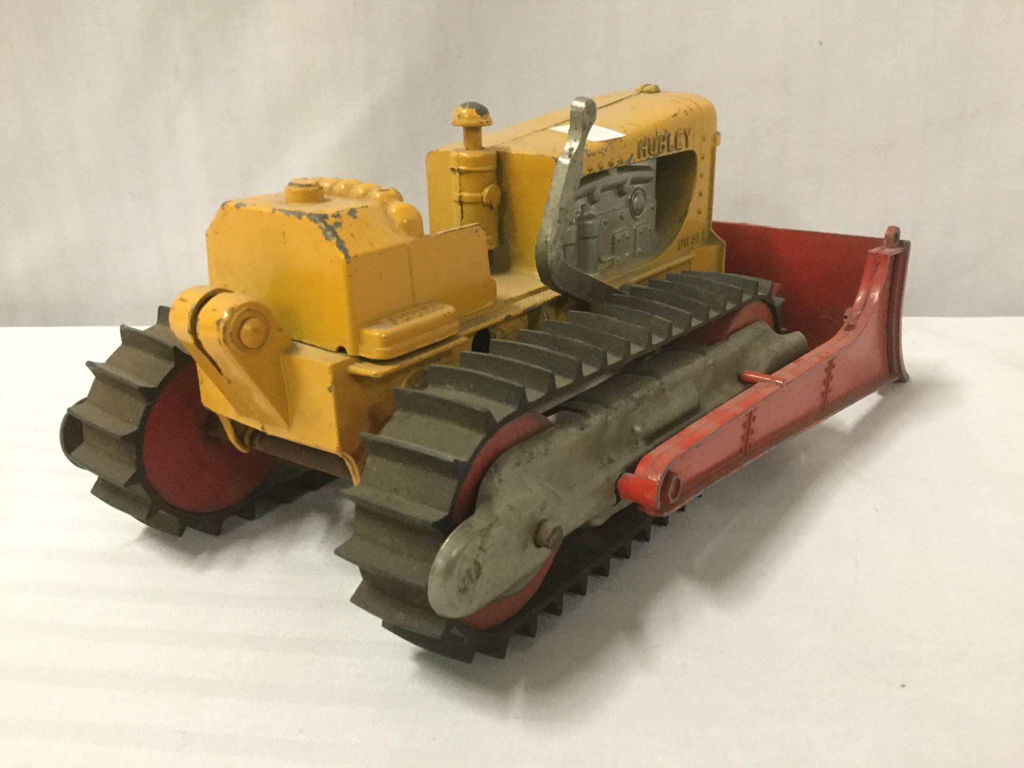 2 Hubley toy bulldozers incl. 1 yellow Hubley Diesel Toy bulldozer & 1 red Hubley toy bulldozer