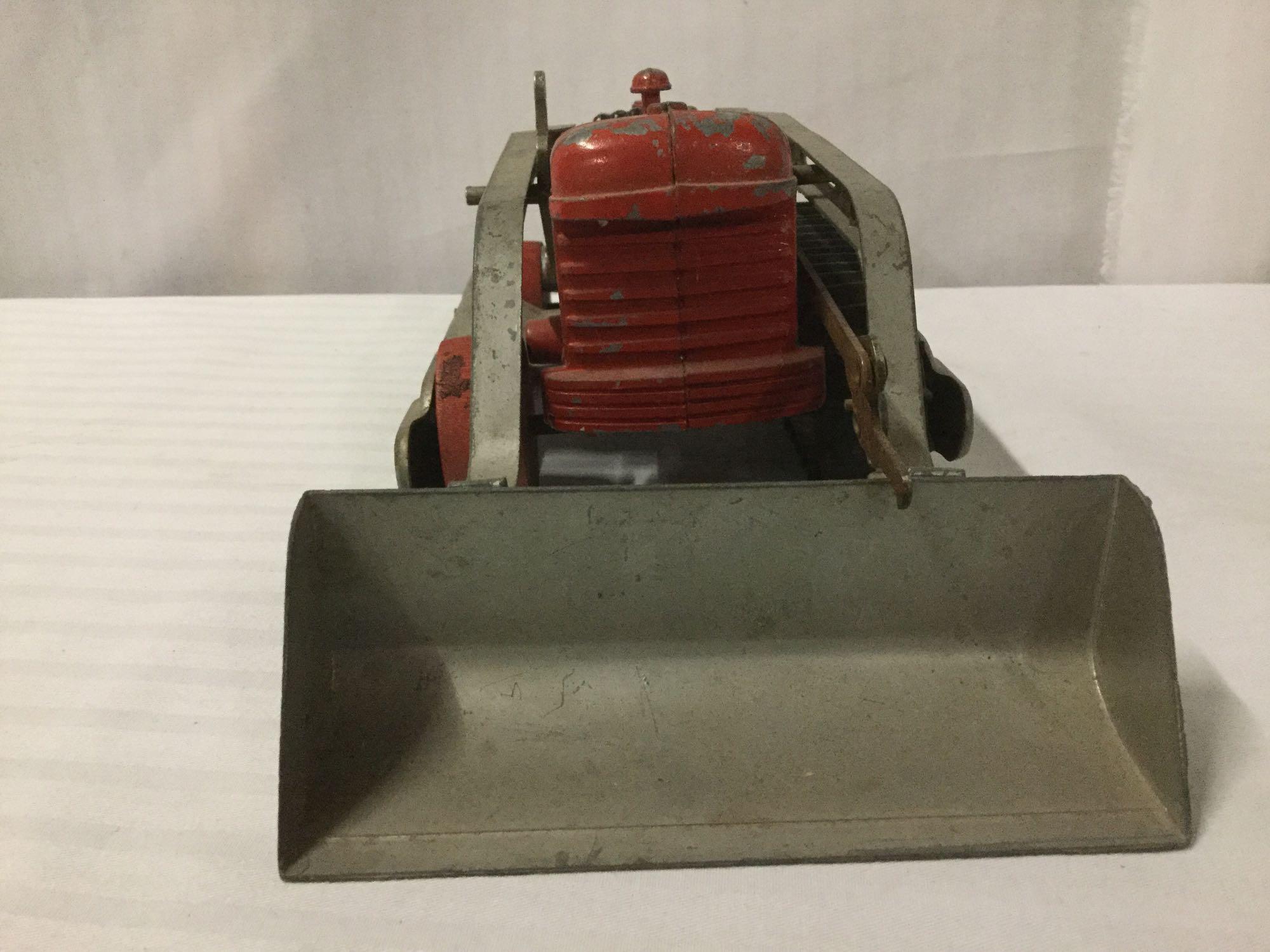 2 Hubley toy bulldozers incl. 1 yellow Hubley Diesel Toy bulldozer & 1 red Hubley toy bulldozer