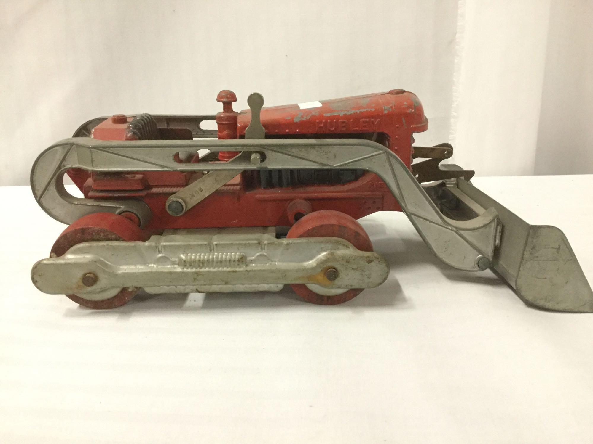 2 Hubley toy bulldozers incl. 1 yellow Hubley Diesel Toy bulldozer & 1 red Hubley toy bulldozer