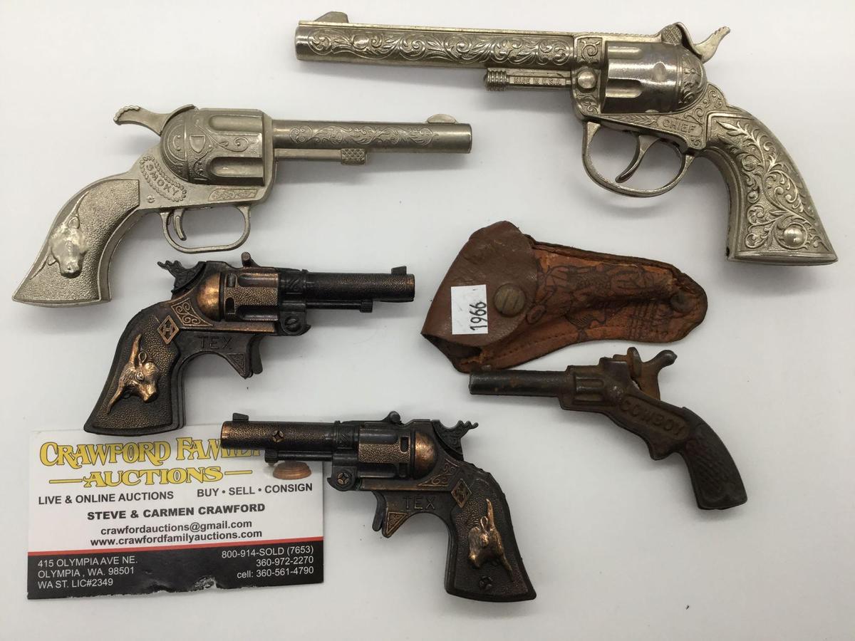 Collection of 5 vintage Hubley 50s era cap guns incl. Cowboy model with matching leather holster