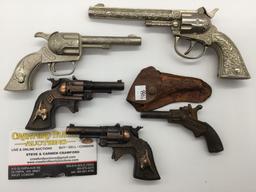 Collection of 5 vintage Hubley 50s era cap guns incl. Cowboy model with matching leather holster