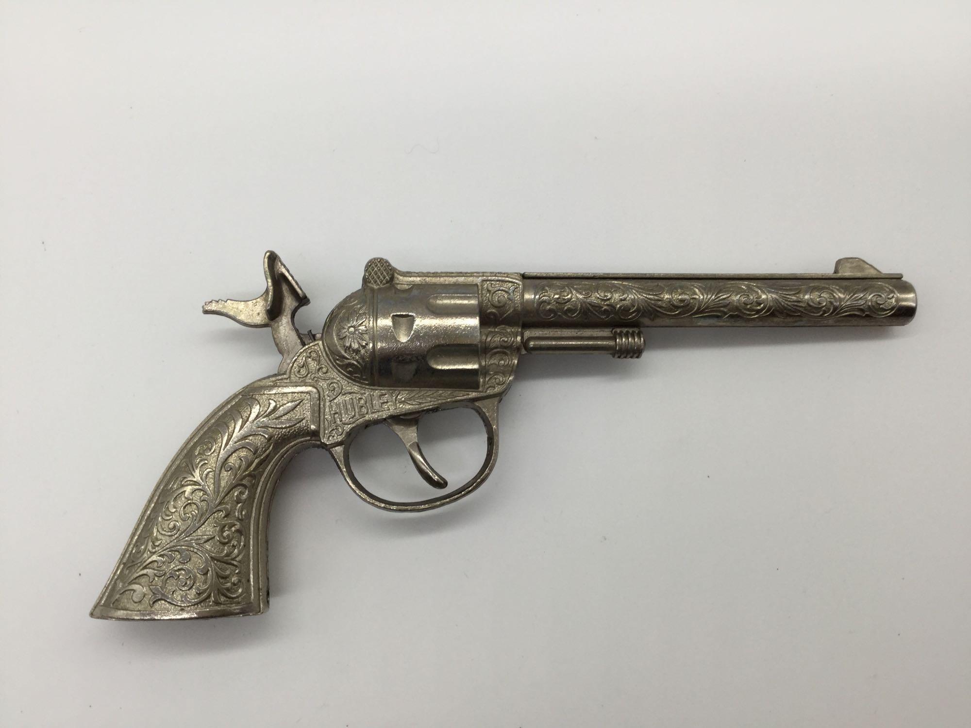Collection of 5 vintage Hubley 50s era cap guns incl. Cowboy model with matching leather holster