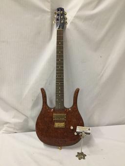 Custom modified Danelectro Longhorn electric guitar w/ burled maple top and custom fitted hard case.