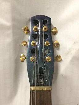 Custom modified Danelectro Longhorn electric guitar w/ burled maple top and custom fitted hard case.