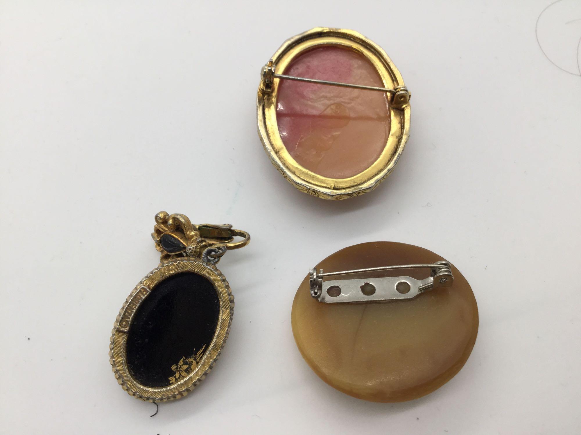 Collection of 11 vintage cameo pendant & brooches incl. shell, composite, agate etc - see pics