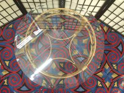 Pair of matching glass top end tables with antique'd gold tone metal frames