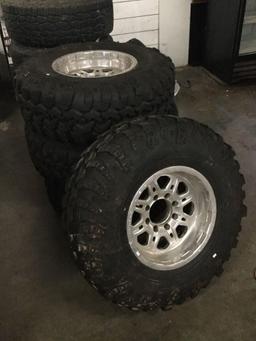 Set of 4 Irok Suler Swamper 36x13.5OR17LT tires with 18.5 inch Weld Racing rims - Nice!