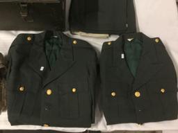 Vintage trunk full of small sized military clothing incl. 3 hates, 2 full uniforms, 2 sacks and