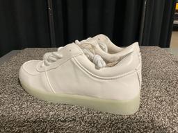LDY women?s LED Siumlation white low shoes. USB connection inside, soles light up. No internal