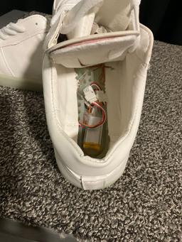 LDY women?s LED Siumlation white low shoes. USB connection inside, soles light up. No internal