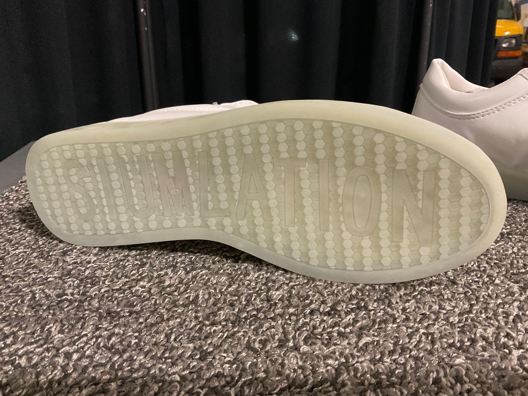 LDY women?s LED Siumlation white low shoes. USB connection inside, soles light up. No internal