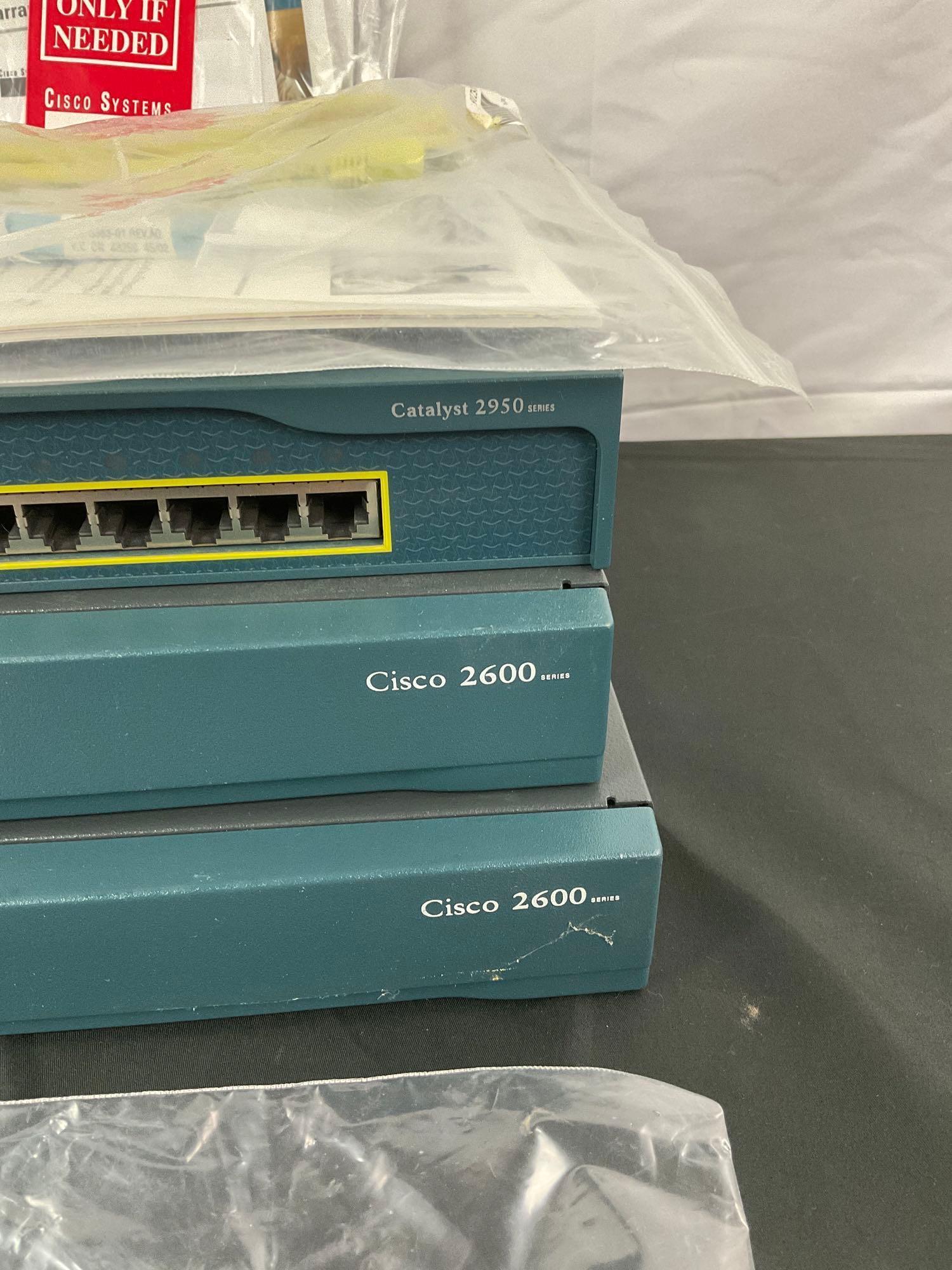 2x Cisco 2600 series routers (Cisco 2610XM & Cisco 2610) & Cisco Catalyst 2950 series