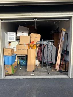 Unit 7 is a 10x30 pretty much full , looks like dolls, clothes , house hold & racks , tools