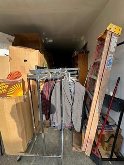 Unit 7 is a 10x30 pretty much full , looks like dolls, clothes , house hold & racks , tools