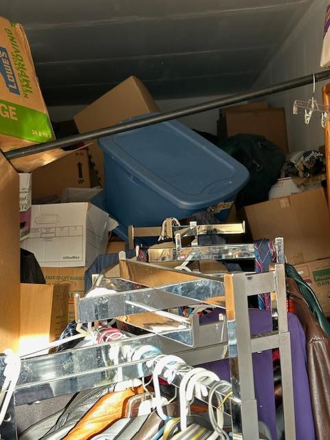 Unit 7 is a 10x30 pretty much full , looks like dolls, clothes , house hold & racks , tools