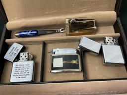 4 Vintage Lighters in Leather Case, Engraved Vietnam Zippo, a similarly aged Zippo, Ronson & Crown