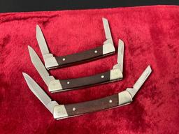 Trio of Vintage Buck Folding Pocket Knives, 705 Pony Double Bladed, Stainless & Wooden Handles