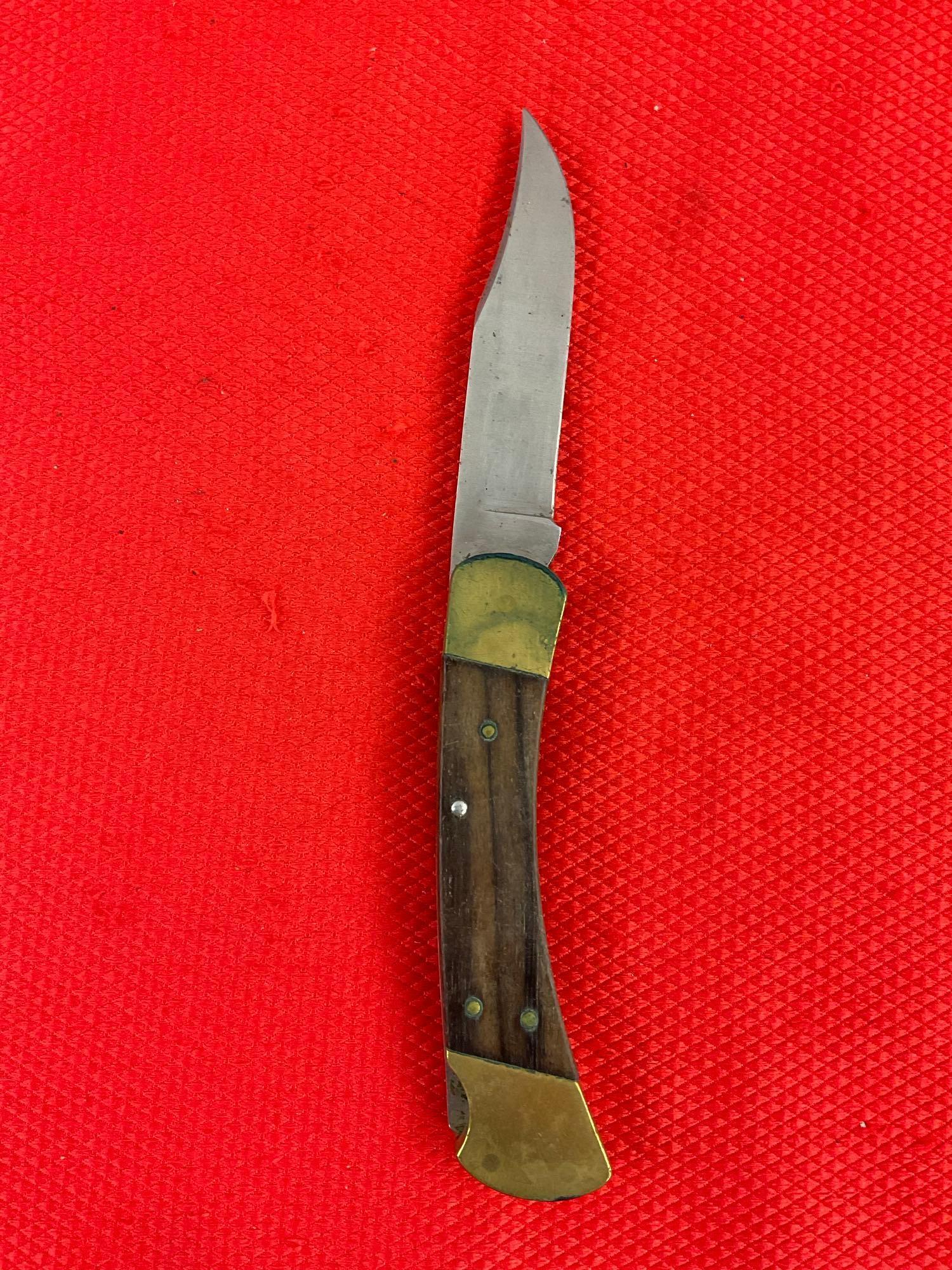 Vintage Buck 3.75" Steel Folding Blade Pocket Knife Model 110 w/ Ebony Handle & Original Sheath. ...