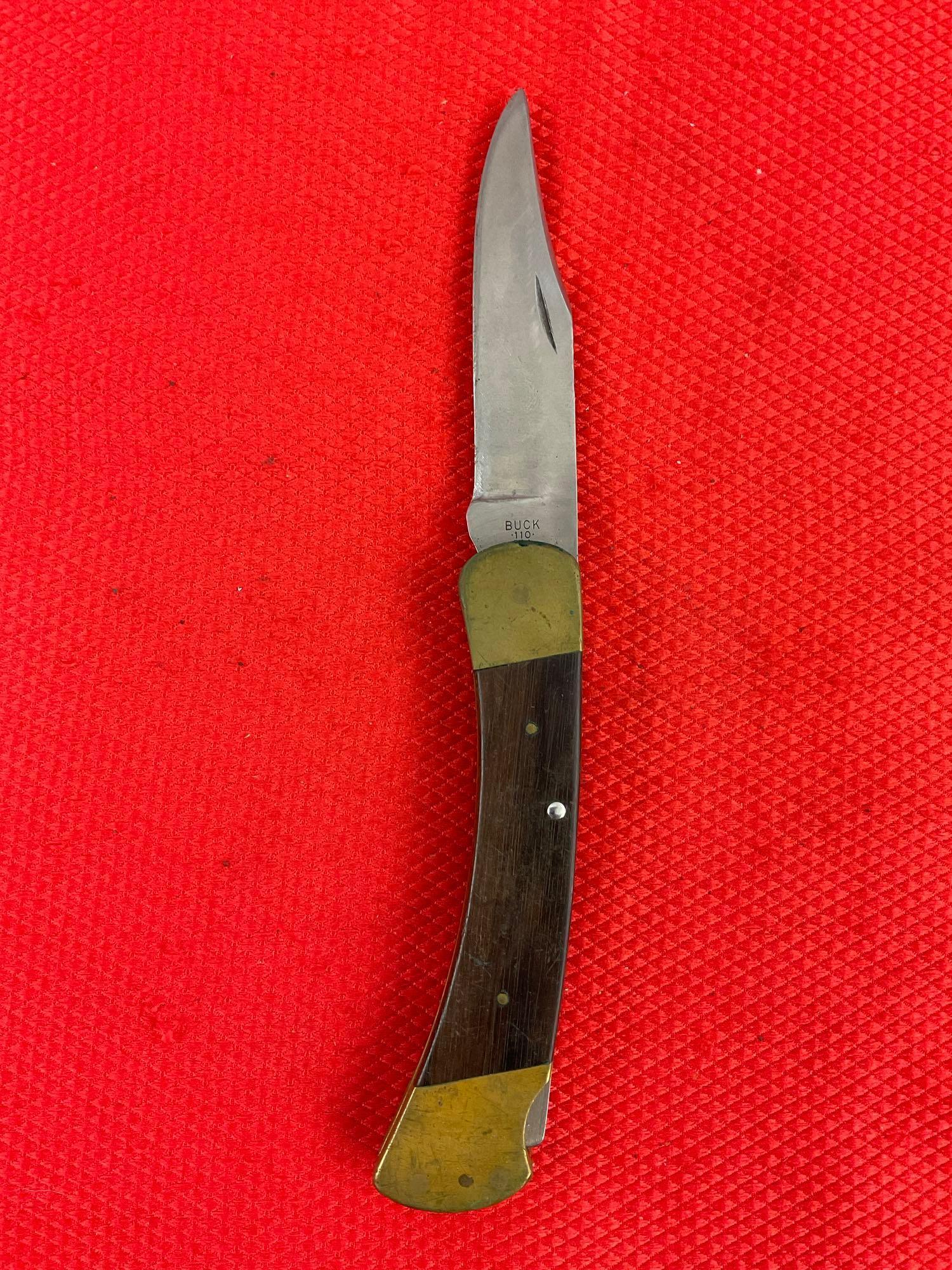 Vintage Buck 3.75" Steel Folding Blade Pocket Knife Model 110 w/ Ebony Handle & Original Sheath. ...