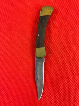 Vintage Buck 3.75" Steel Folding Blade Pocket Knife Model 110 w/ Ebony Handle & Original Sheath. ...