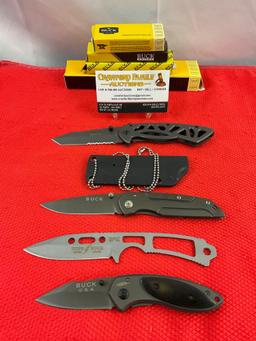 4 pcs Modern Buck Knife Assortment. 1x 870-2, 1x Csar-T 680, 1x DA14, 1x Unnumbered. NIB. See pics.