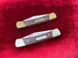 Pair of Vintage Buck 704 Single Blade Folding Pocket Knives Slip Joint, one w/ Brass metal