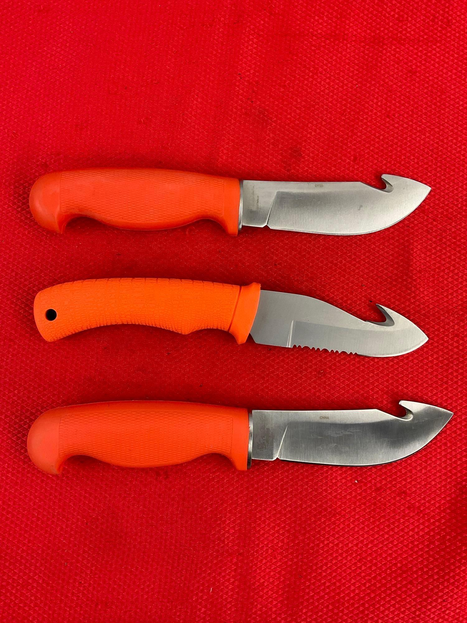 3 pcs Rite Edge Steel Fixed Blade Hunting Knives w/ Guthook, Orange Handles & Nylon Sheathes. See