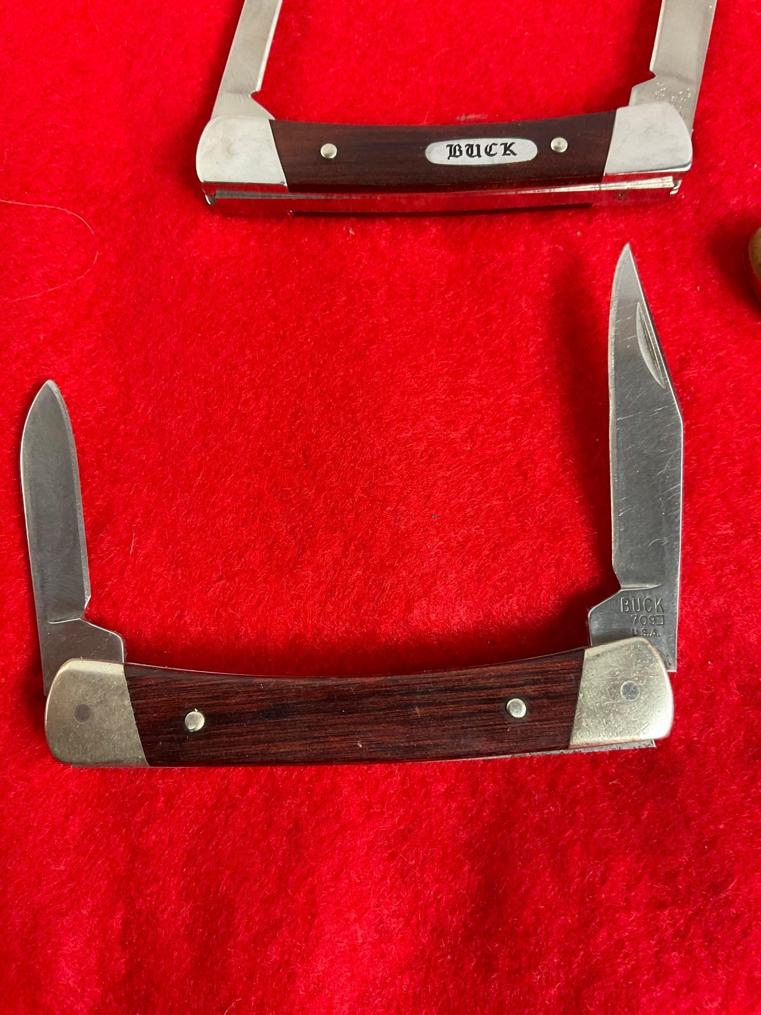 4x Buck Folding Pocket Knives 1x Single Blade 2x Dual Blade 1x Triple Blade Numbered 705,709,703,...